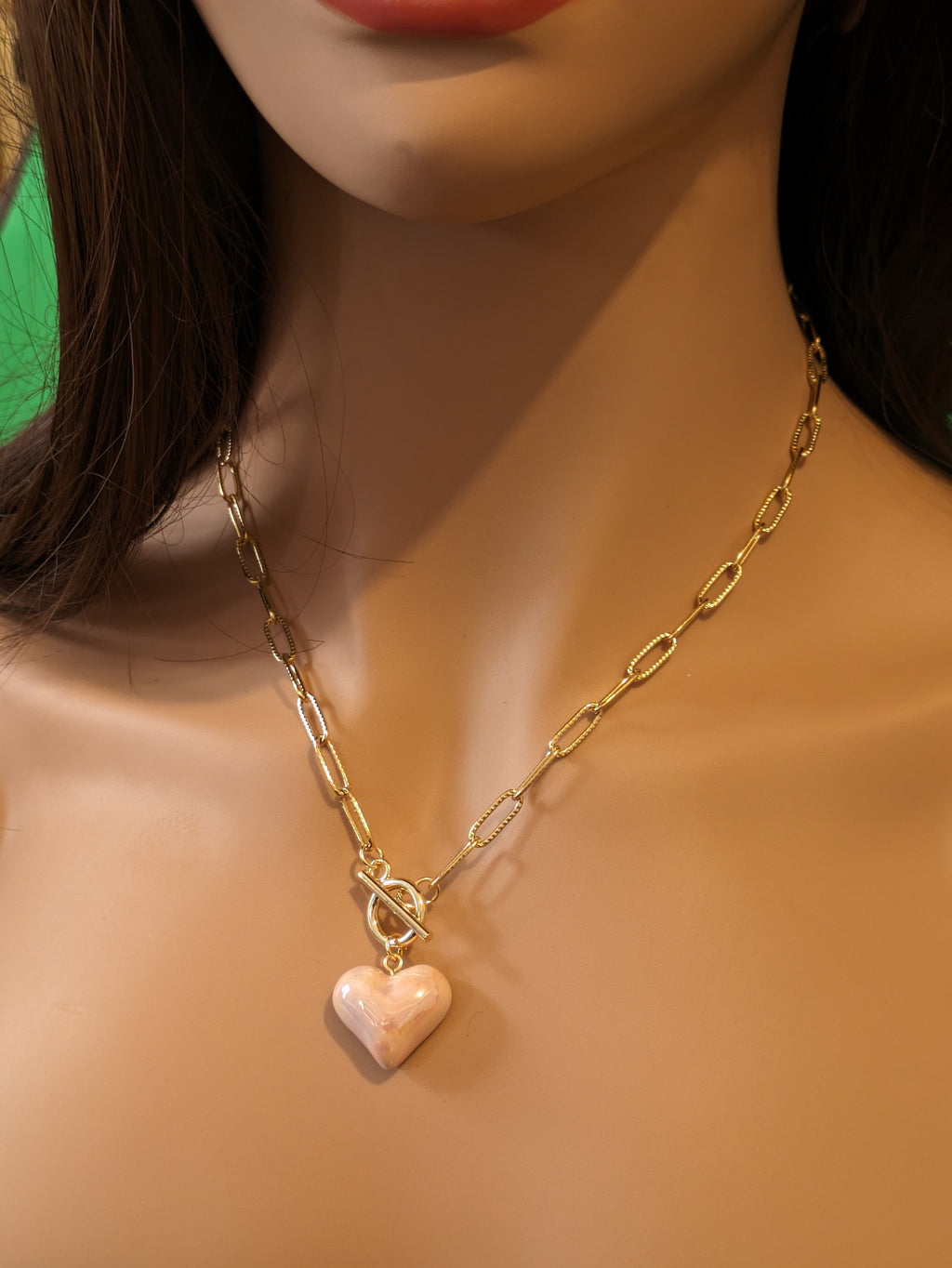 Collier cœur rose.
