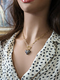 Collier cœur noir.