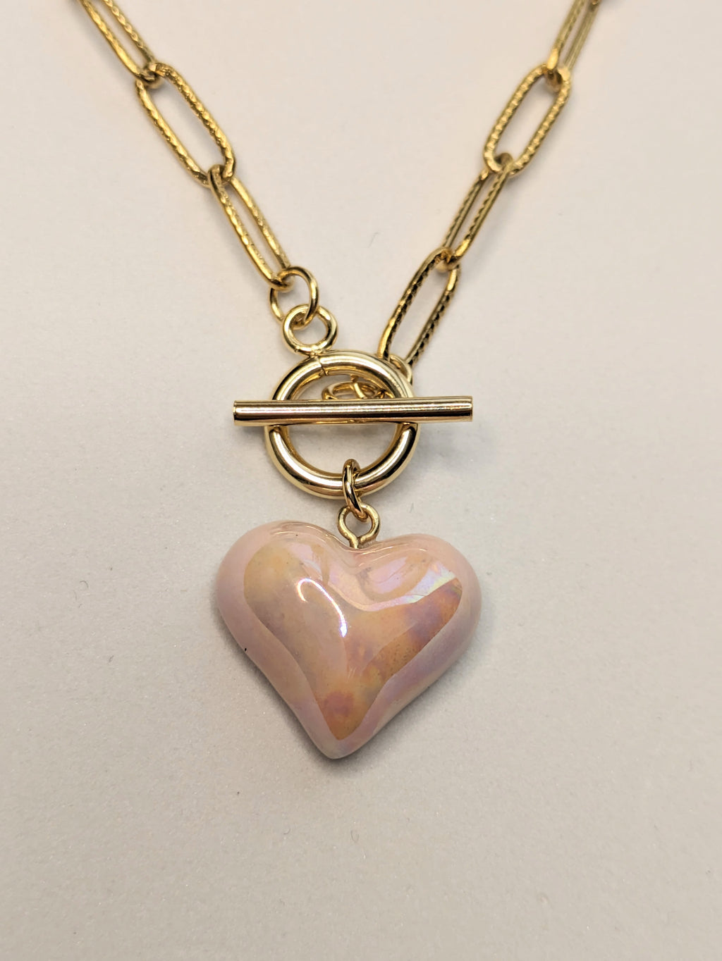 Collier cœur rose.